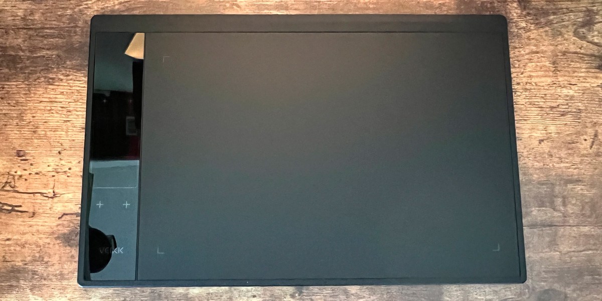 Veikk A30 V2 Drawing Tablet on wooden background Veikk A30 V2 Drawing Tablet on wooden background